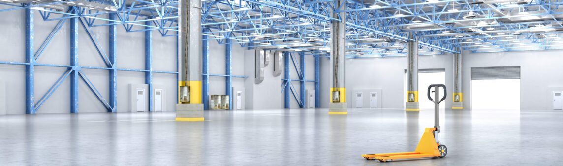 Stock image of an empty warehouse from Canva to accompany article on warehouse project management