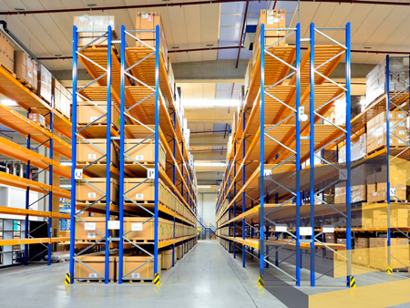 A set of blue racks to illustrate article about warehouse racking installation