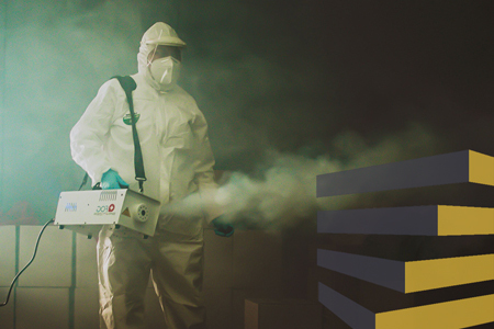 Man fumigating area to illustrate the imprtance of professionals in the cleaning of industrial warehouses in Mexico