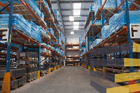 Logistics centre aisle to illustrate article on warehouse floor labels.