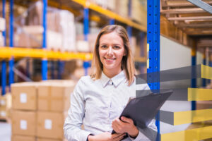Woman with clipboard to illustrate article on BPO services for your warehouse